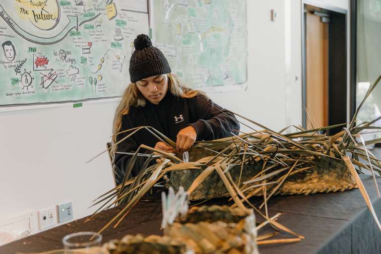 Live weaving with our sketch in the background