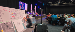 Getting down low whilst graphic recording at the Legacy Early Learning Fono